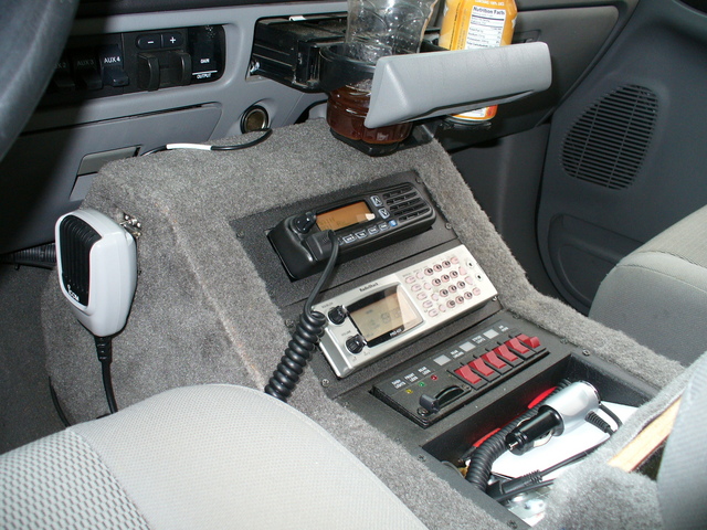 Icom F5061 mounted in center console, wired to center antenna.